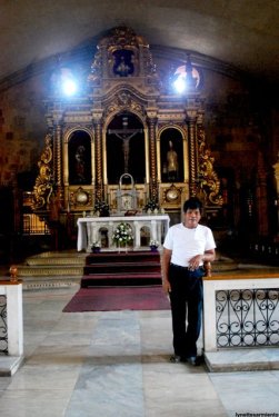 It's all because of this man. Kuya Noel, the caretaker, saw me taking photos of the church from all the possible angles I could think of. He invited me over and asked me I wanted to see the interior. Who was I to say no to that?